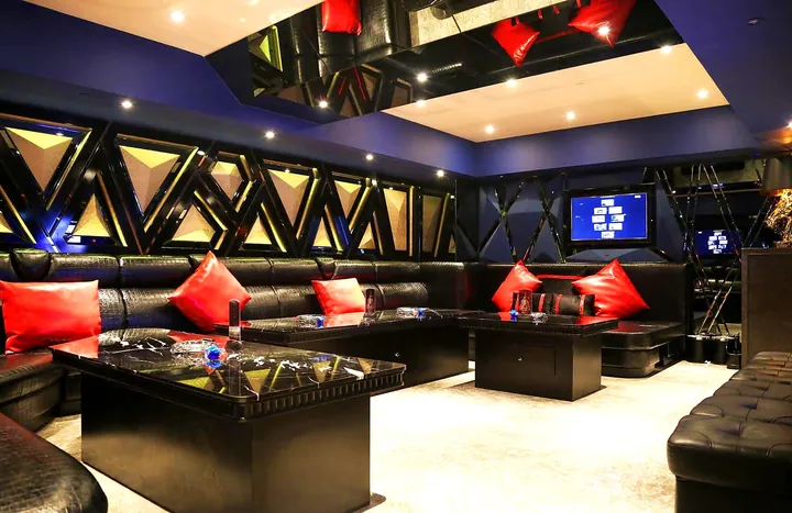 Black-and-gold mirrored party lounge