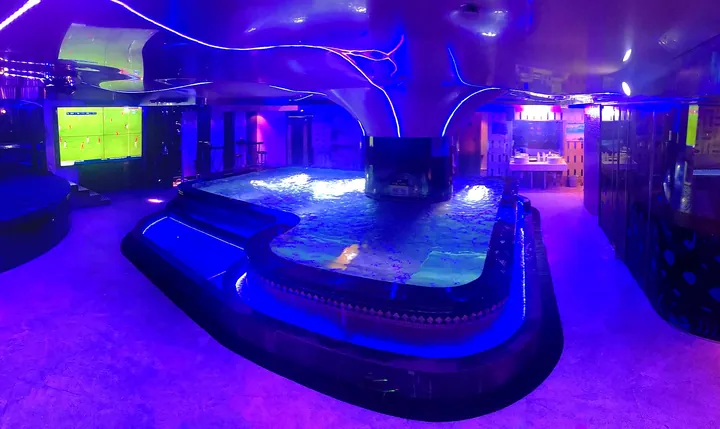 Purple-blue jacuzzi bathing zone