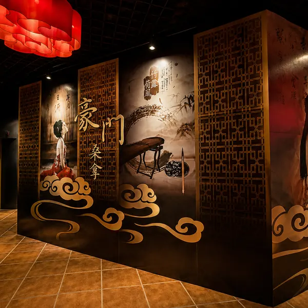 Carved mural entrance to private rooms