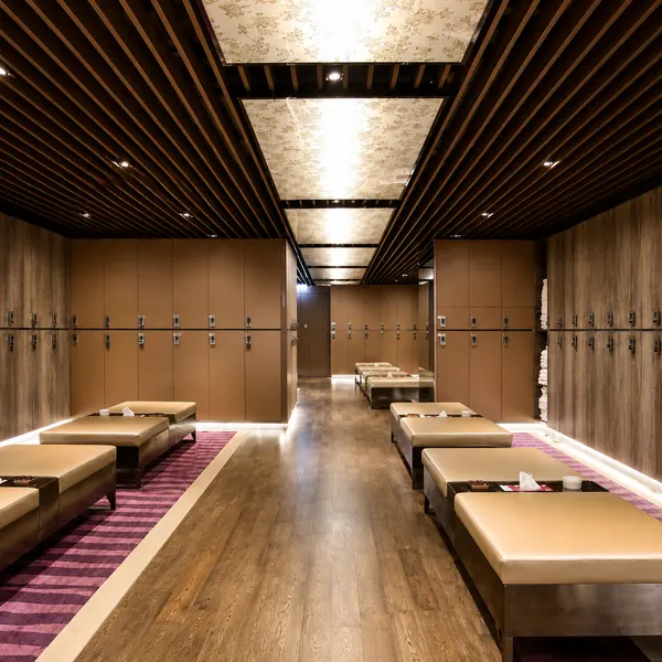 Wood locker room with bench seating