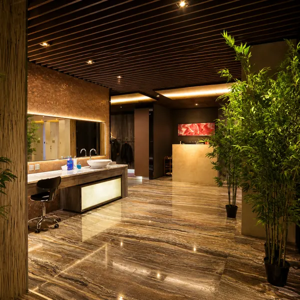 Vanity area accented with greenery
