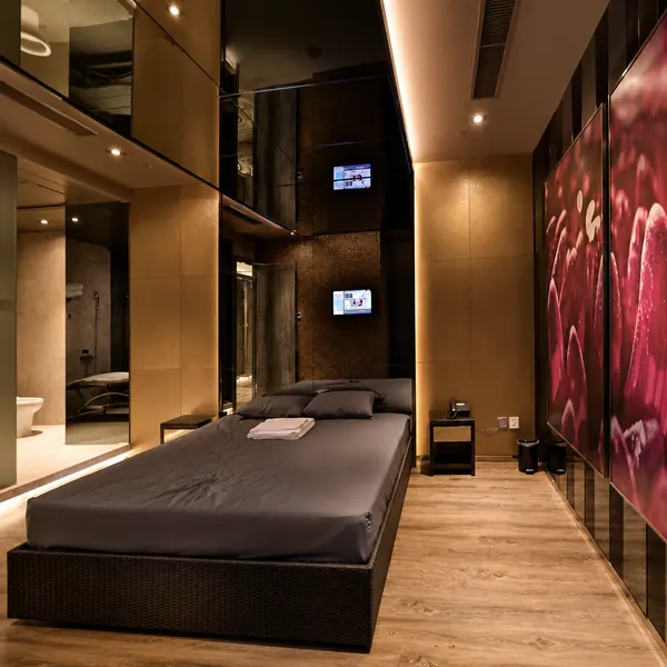 Waterbed room with floral wall art
